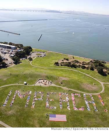 Chronicle photo of protesters spelling out IMPEACH in Berkeley